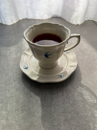 Tazza in porcellana con piattino