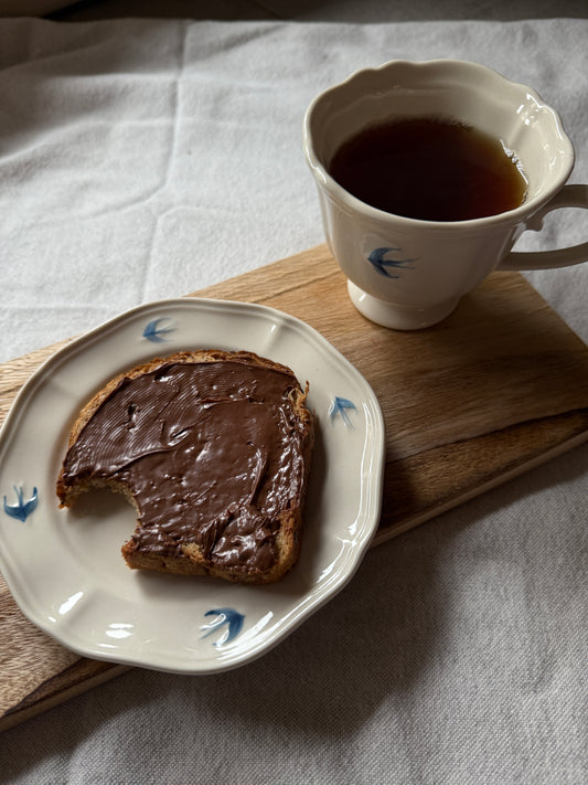 Tazza in porcellana con piattino